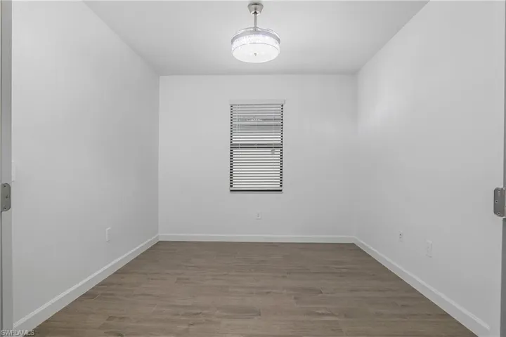 Versatile Den with double french doors is perfect for a home office or additional TV room.