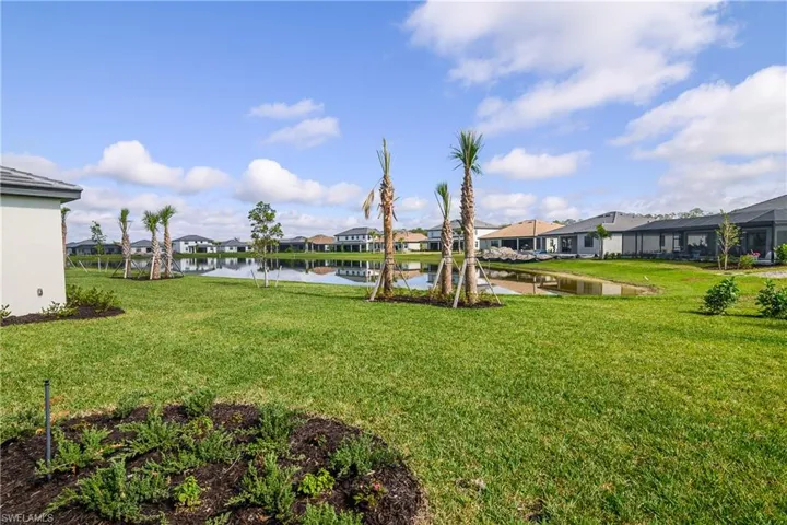 The back yard is large with plenty of room for a pool, and includes professional landscaping.