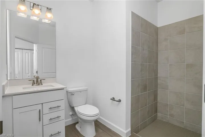 Ensuite Bath with walk-in shower in guest bedroom.
