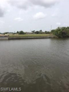 Looking at the lot from across the canal.