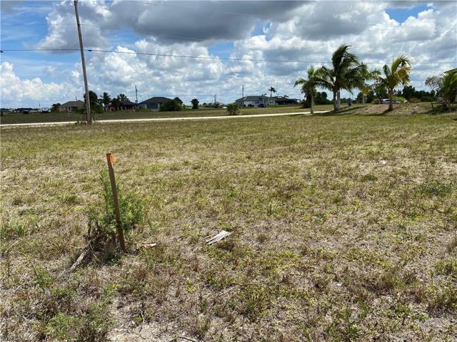 Looking at the lot from the SW corner of the seawall towards the street.