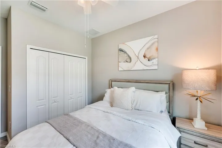 Bedroom with a closet and ceiling fan