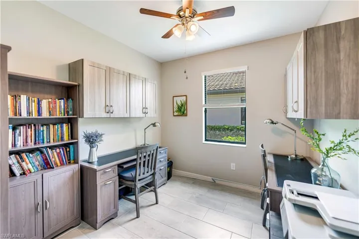 Tiled office with ceiling fan