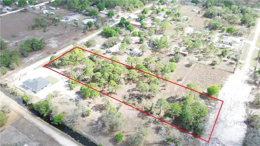 Aerial overview of property's location with property parcel outlined