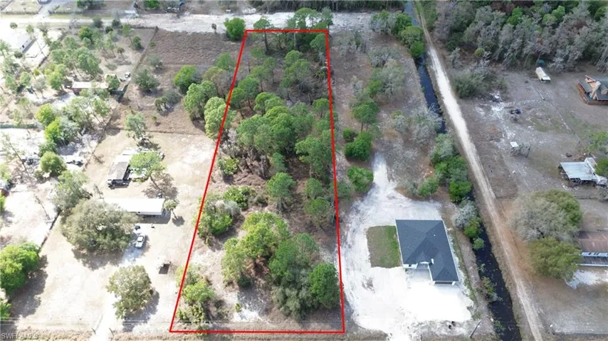 Aerial overview of property's location with property boundaries highlighted