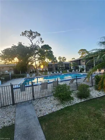 Community pool with fence