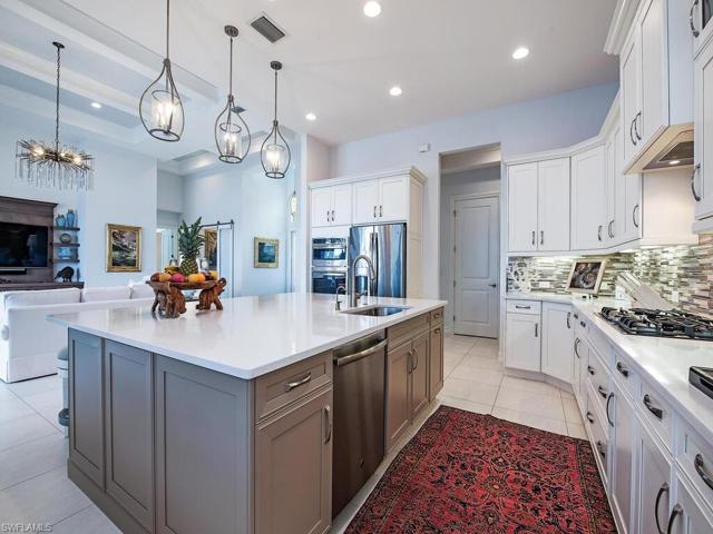 Gas cooktop and plenty of storage here include soft closure and pull outs, pot and pan drawers, under cabinet lighting