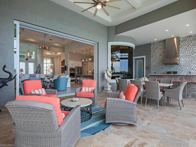 Outdoor living custom kitchen with additional seating area