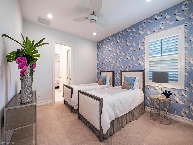 Additional bedroom also includes custom closets