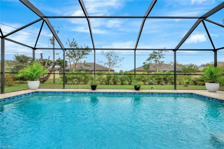 Amazing home located in SE Cape Coral with a brand new beautiful built-in pool installed in 2022!
