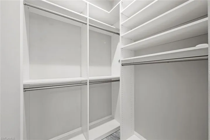 Guest bedroom with custom built in closets