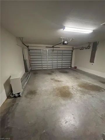 Garage featuring electric panel