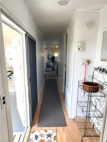 Side door leading to the backyard and carport