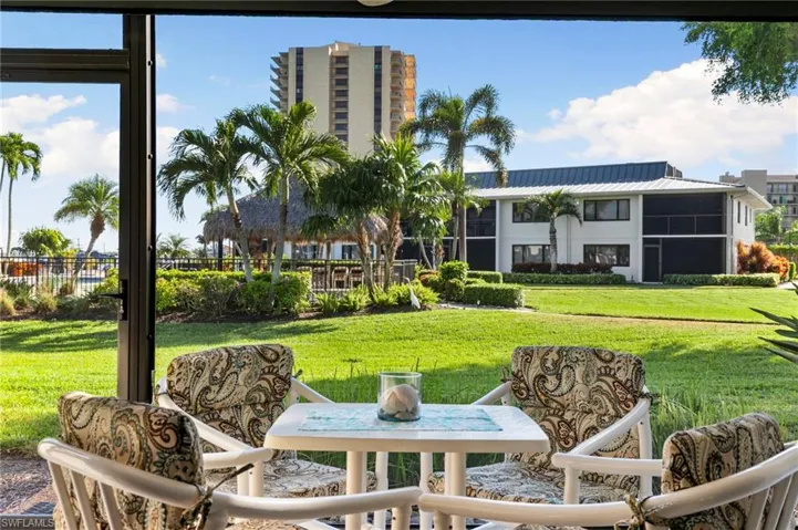 Or dine on your lanai with picture window screens and a view