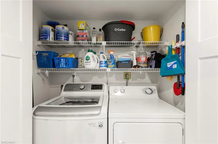 Washer in dryer in the unit with shelving