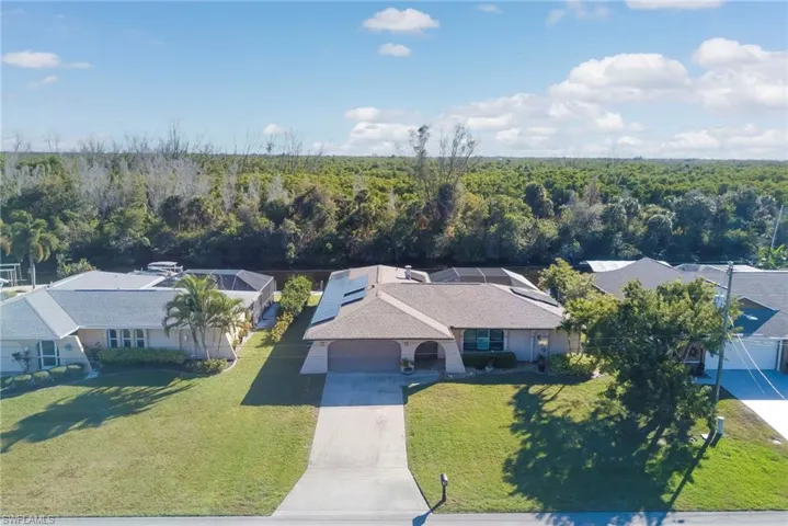 Aerial view of property and surrounding area
