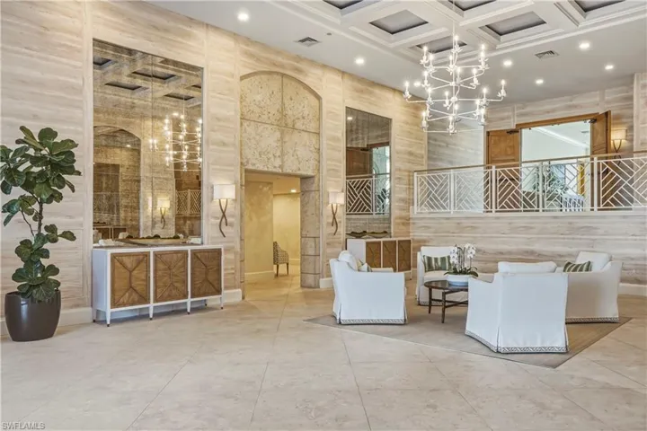 Building lobby with recessed lighting and high coffered ceiling