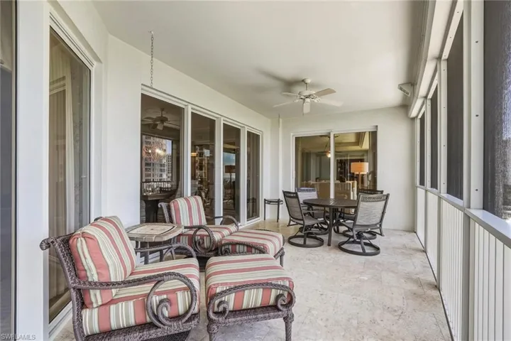 Lanai featuring a ceiling fan and outdoor dining space