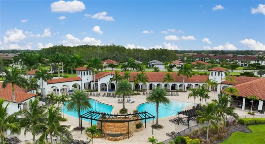 View of swimming pool with lap pool. Community town center
