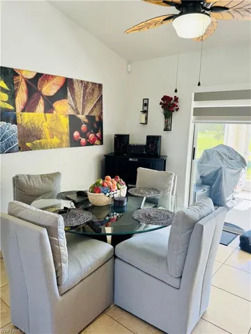 Dining room with ceramic tile.