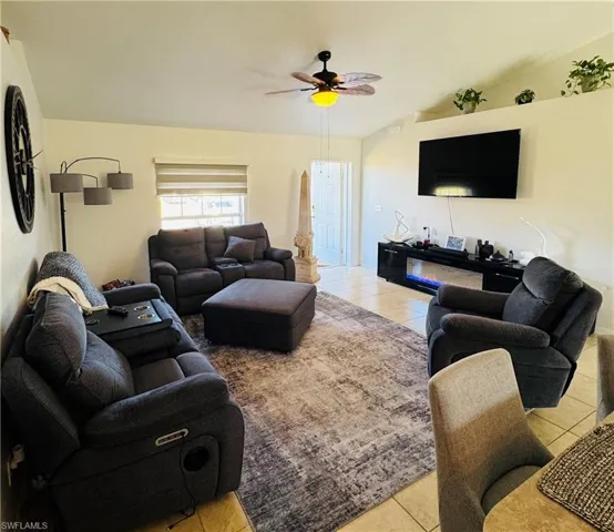 Living room with ceramic tile floors.