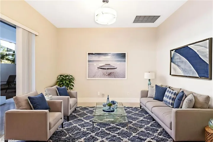 Virtually Staged gathering space shared with the open Kitchen