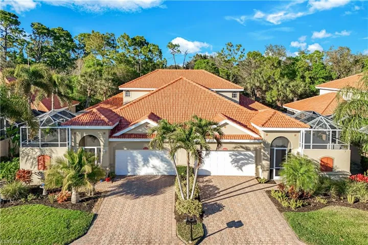 Attached Villas with private entry-Unit is on the right, rear borders private preserve and faces north