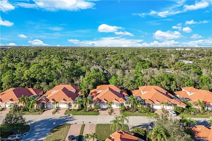 Surrounded by greenspace and meandering roads-rear facing North