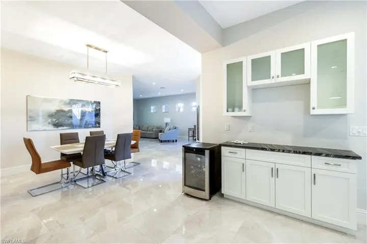 Updated w/walls removed and open space for your coffee bar or entertainment bar