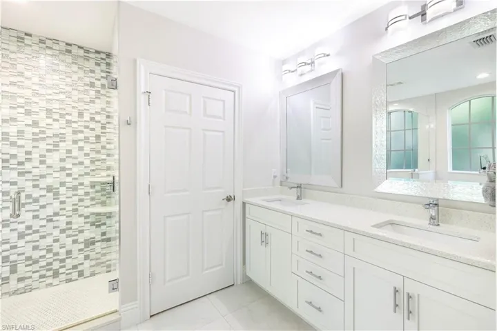 Refreshing, Updated, Clean lines in this MBath w/dual sinks and pvt water closet