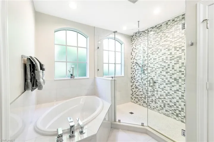 Lge Walk in Shower w/ rain and hand held water features, Lge soaking tub
