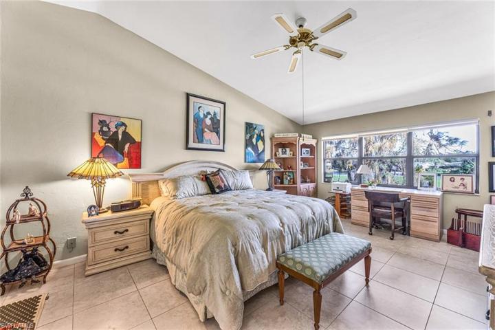 Large master bedroom with space for desk area.