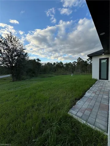 View of yard, half bath