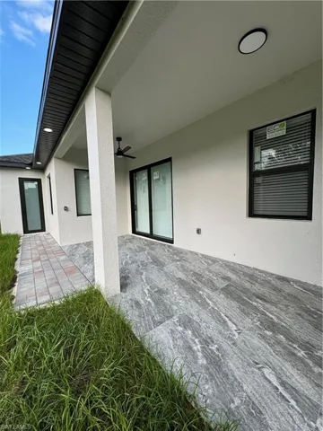 View of patio with ceiling fan
