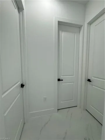View of corridor Guess bath and two bedroms