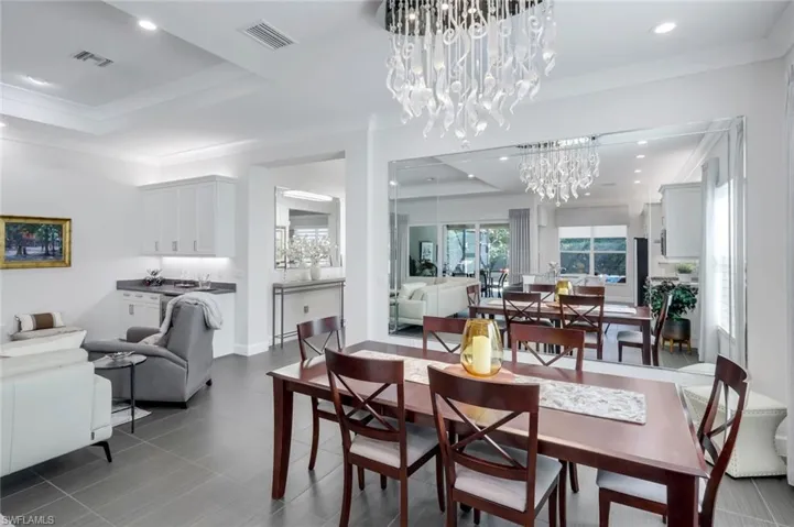The dining area has space for a table that seats 8-10. A lovely window near the dining area allows natural light to pour through the home!