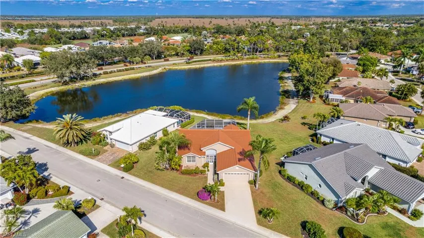 Aerial view of the house with a large body of water