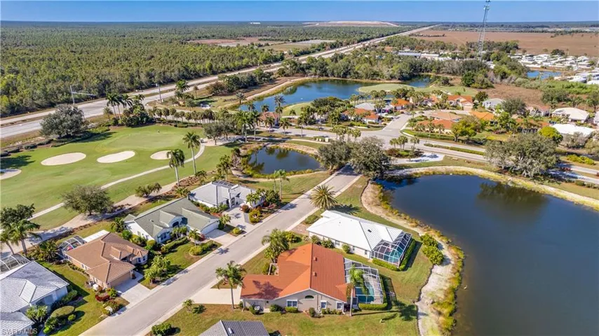 Ariel view of the house, lake and golf course