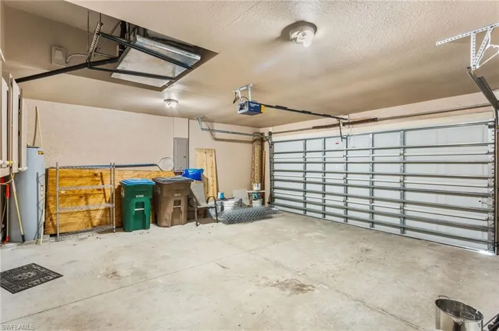 Wind rate garage door with electric garage door opener.