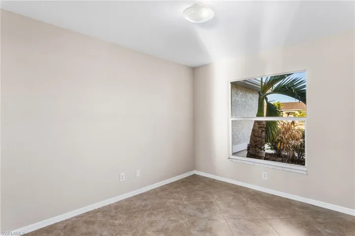 Empty room with baseboards