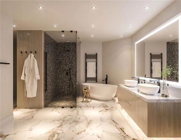 Bathroom featuring tile floors, plus walk in shower, and dual bowl vanity