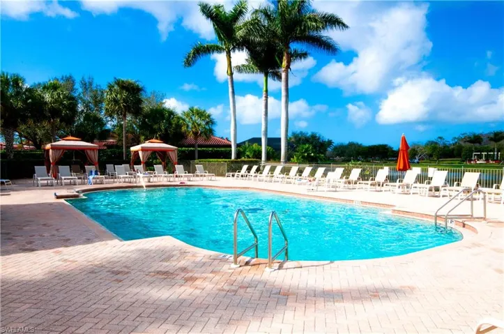 View of swimming pool with a gazebo and a patio