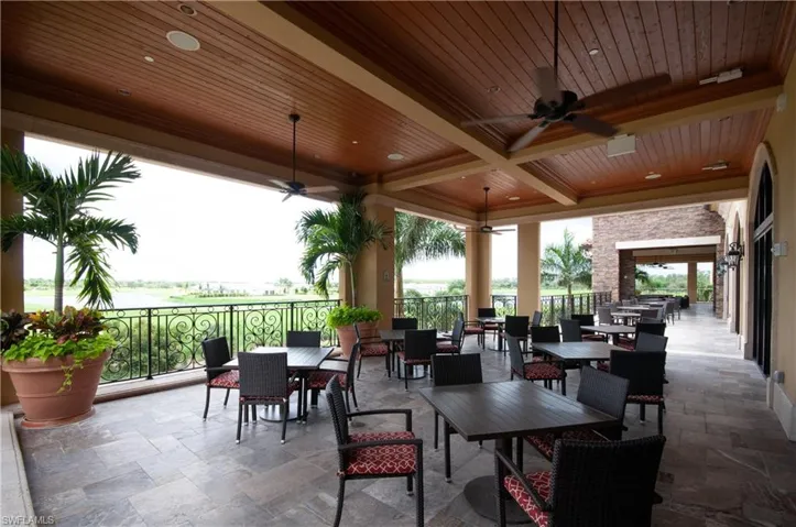 View of patio featuring ceiling fan