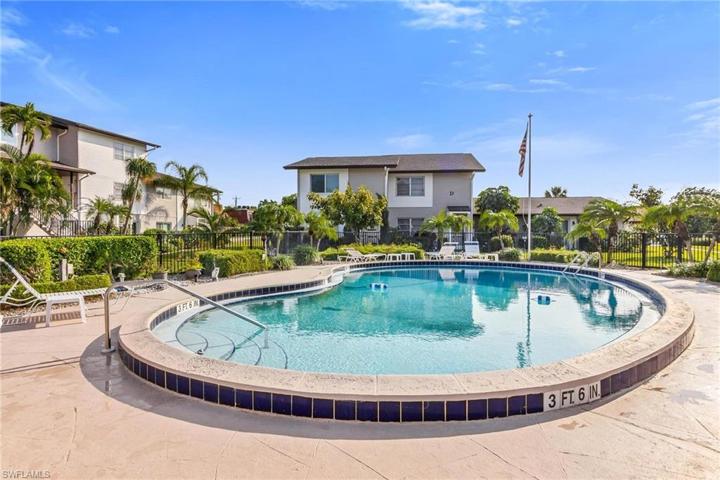 Community Pool and club area with grill and fire pit.