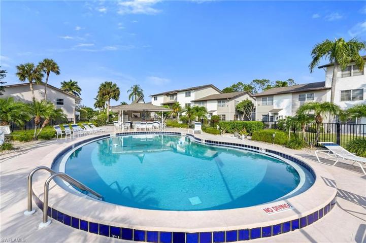 Community Pool and club area with grill and fire pit.