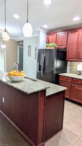 Kitchen is adjacent to sunny breakfast room