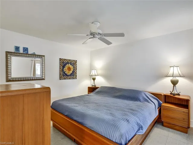 Bedroom featuring ceiling fan and light tile patterned floors