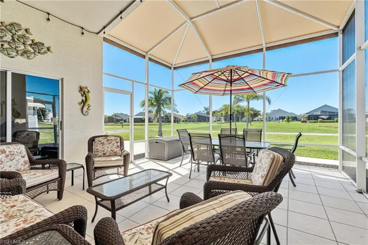 Sunroom / solarium with a residential view