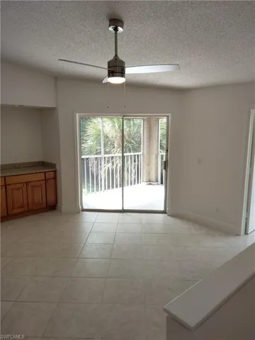 Tiled Living Room with Fan