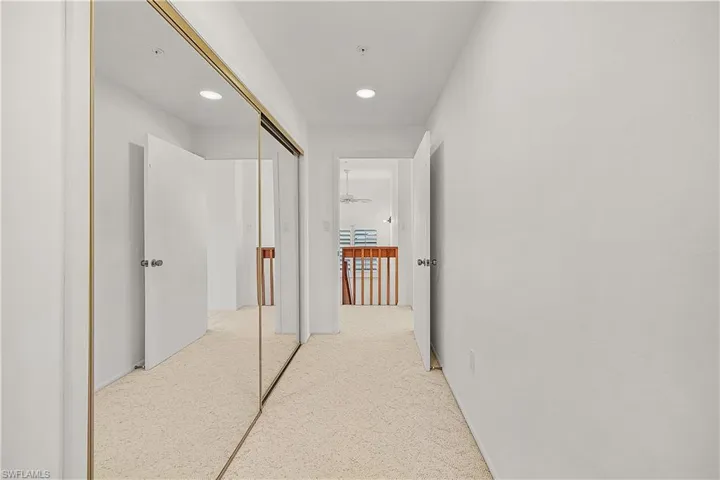 Hall featuring recessed lighting